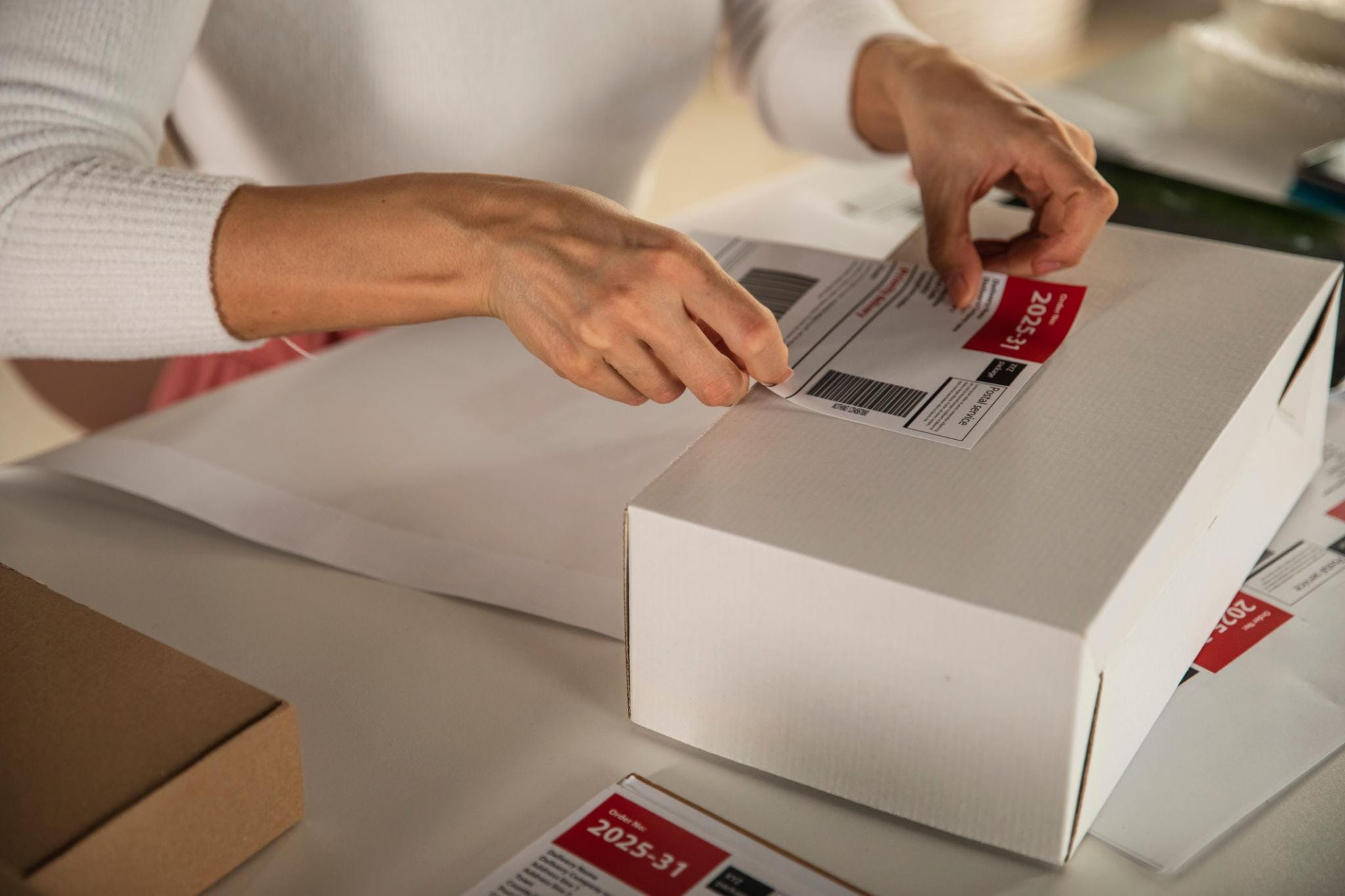 Labelling a watch box for shipment to a wholesale client