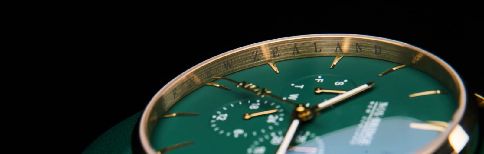 Close-up of a custom NOX-BRIDGE New Zealand green watch dial